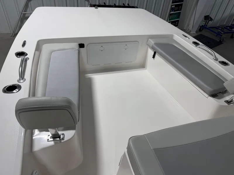 Slide: The Image of 2026 Bay Rider 2260 FS Skiff interior with seating and storage compartments. - 7