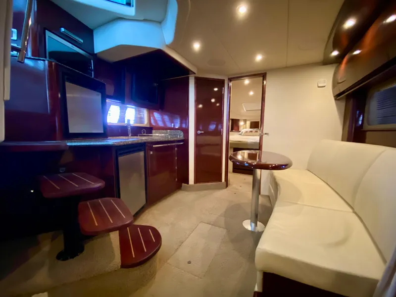 Slide: The Image of Luxurious interior of 2008 Sea Ray 38 Sundancer yacht with modern amenities and elegant design. - 38