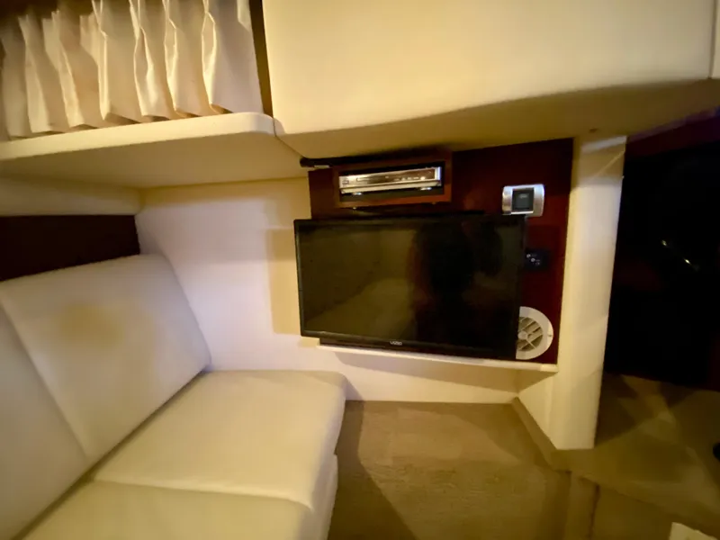 Slide: The Image of Interior of 2008 Sea Ray 38 Sundancer with TV and seating area. - 42