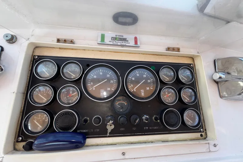 Slide: The Image of Instrument panel of a 1989 Jefferson 42 Sundeck Motor Yacht with gauges and controls. - 23