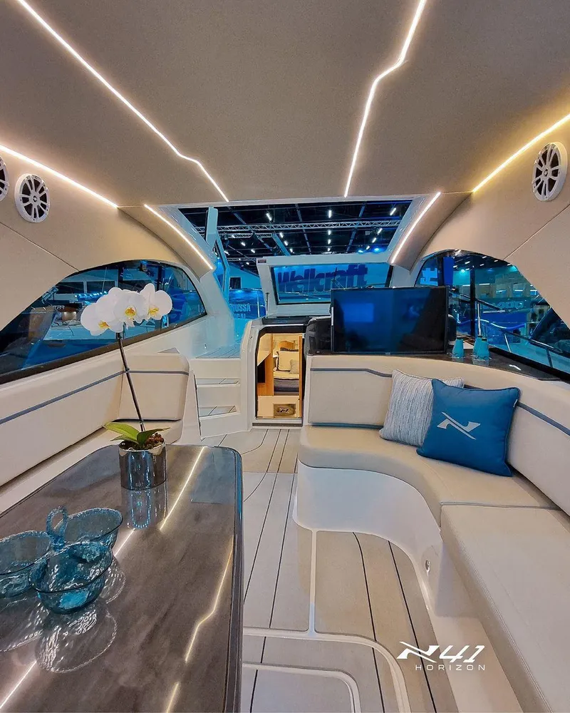 Slide: The Image of Luxurious interior of 2025 NX Boats NX41 HORIZON with modern seating and elegant decor. - 2