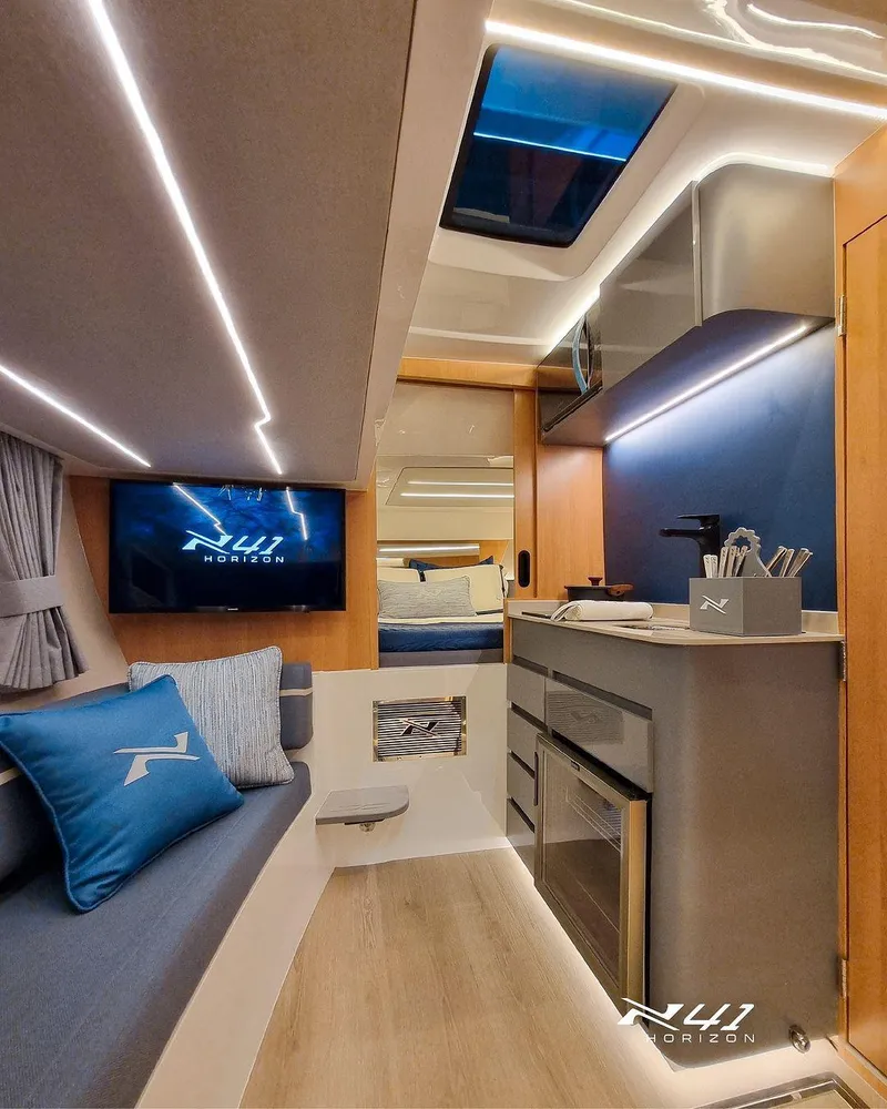 Slide: The Image of Luxurious interior of 2025 NX Boats NX41 HORIZON with modern amenities and sleek design. - 5