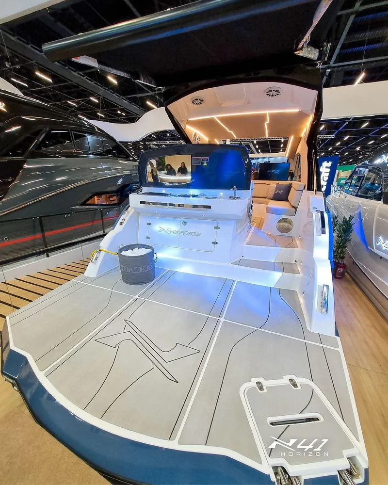 Slide: The Image of 2025 NX Boats NX41 HORIZON luxury yacht interior with modern design and ambient lighting. - 9