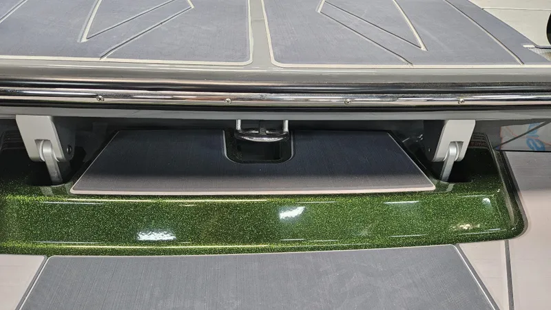 Slide: The Image of 2025 Heyday H22 boat deck with sleek design and green accents. - 10