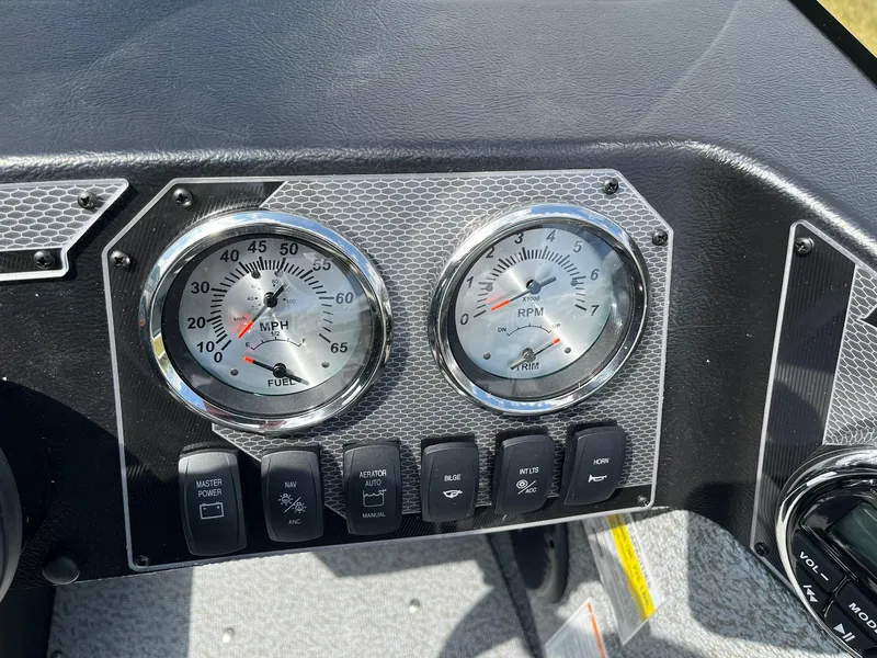 Slide: The Image of Dashboard of 2026 Lund 1775 Adventure SS with speedometer and RPM gauges. - 16
