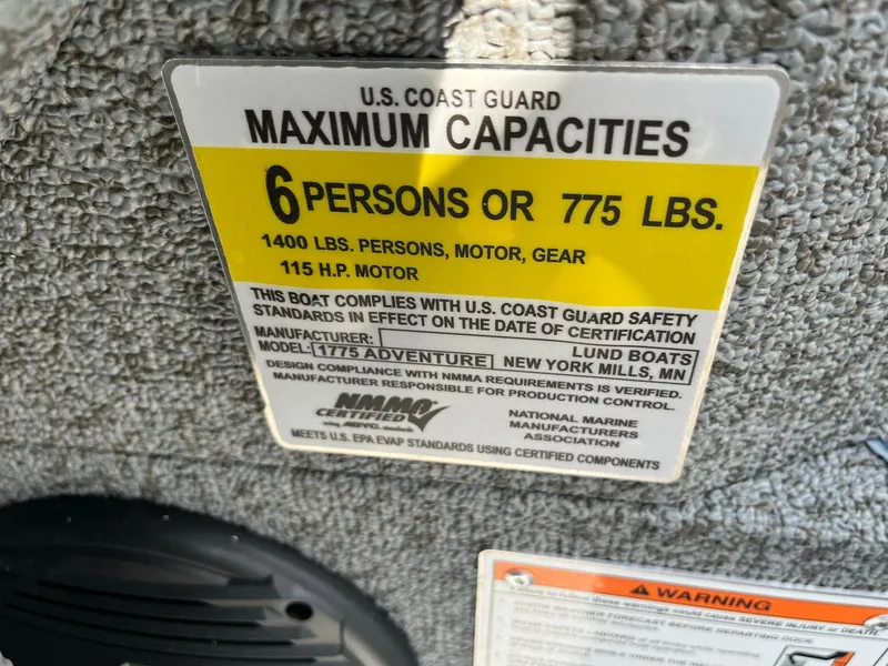 Slide: The Image of 2026 Lund 1775 Adventure SS boat capacity label, 6 persons or 775 lbs, 115 HP motor. - 24