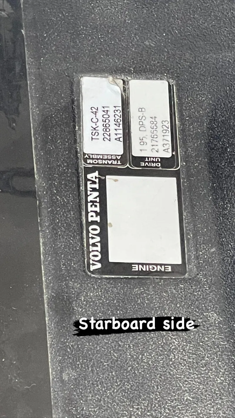 Slide: The Image of Volvo Penta engine label on 2015 Regal 35 Sport Coupe, starboard side. - 22