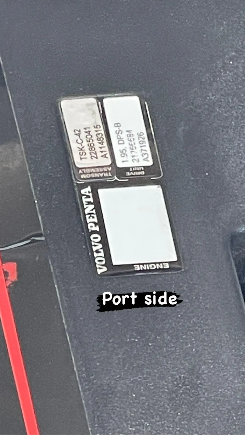 Slide: The Image of Volvo Penta engine label on 2015 Regal 35 Sport Coupe, port side view. - 23