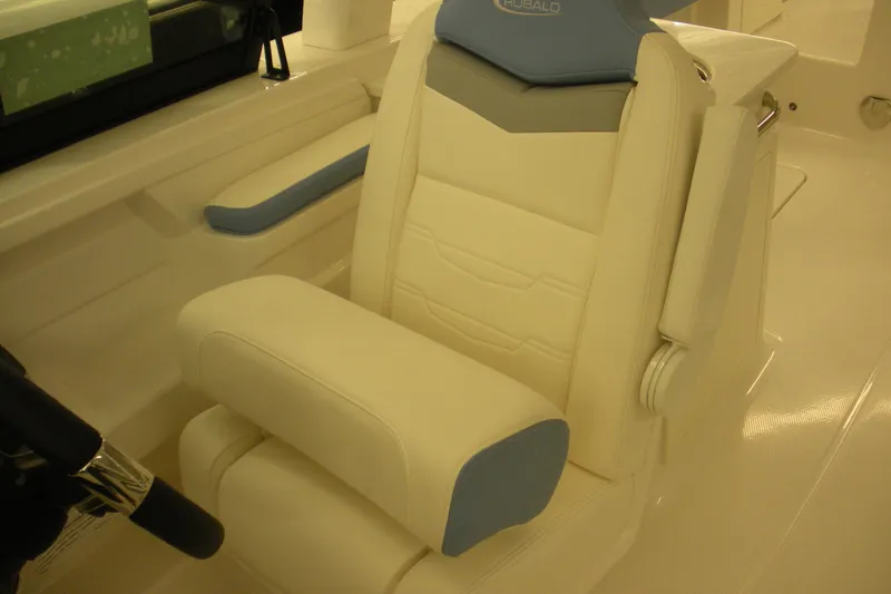 Slide: The Image of 2026 Robalo R257 Dual Console boat seat, featuring white and blue cushioned design. - 10