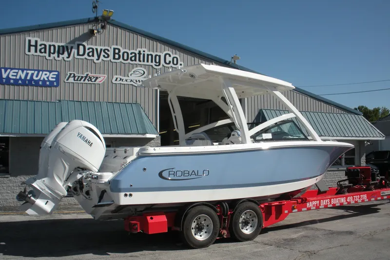 Slide: The Image of 2026 Robalo R257 Dual Console boat on trailer at Happy Days Boating Co. - 20