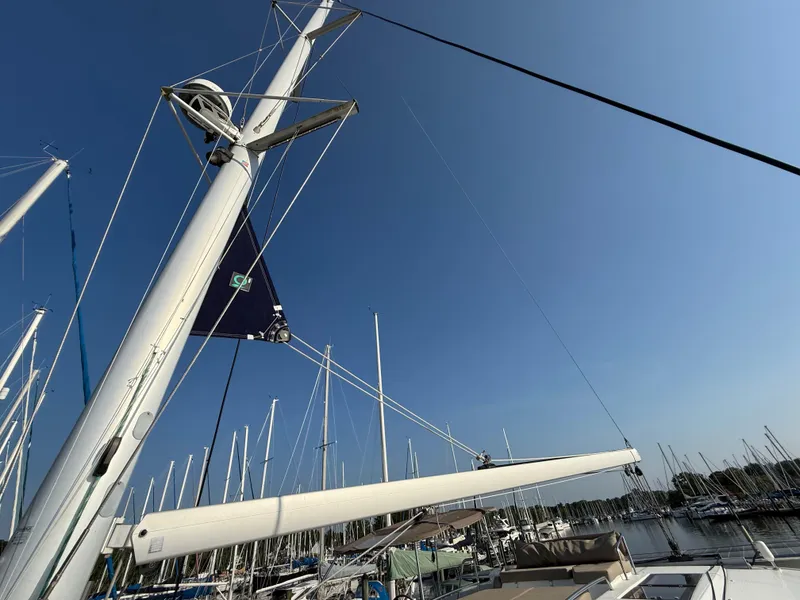 Slide: The Image of Sailboat mast and boom of 2015 Fountaine Pajot Helia 44 against clear blue sky. - 18