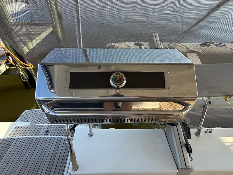 Slide: The Image of Stainless steel grill on a 2015 Fountaine Pajot Helia 44 catamaran deck. - 19