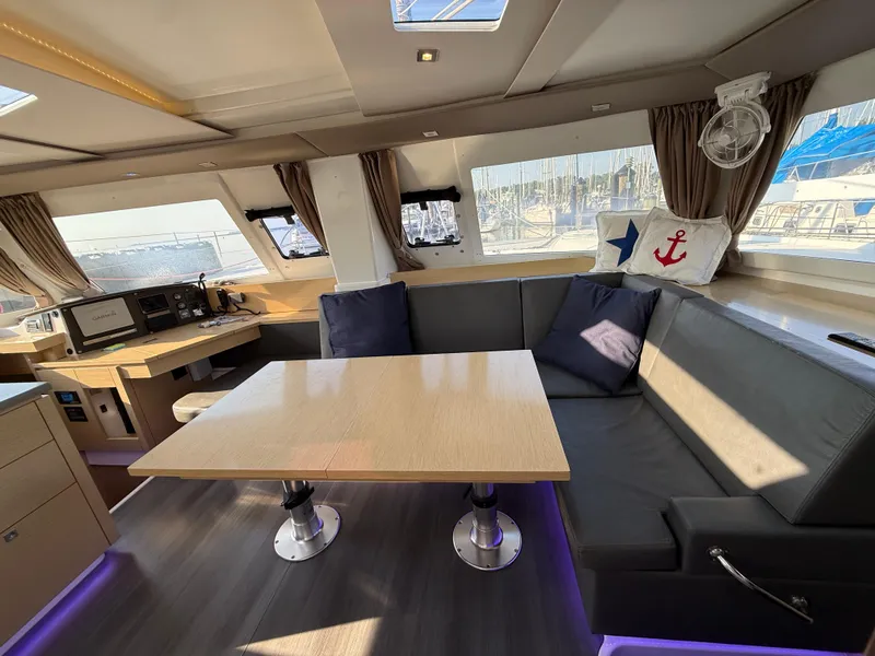 Slide: The Image of Luxurious interior of 2015 Fountaine Pajot Helia 44 catamaran with modern seating and navigation area. - 26
