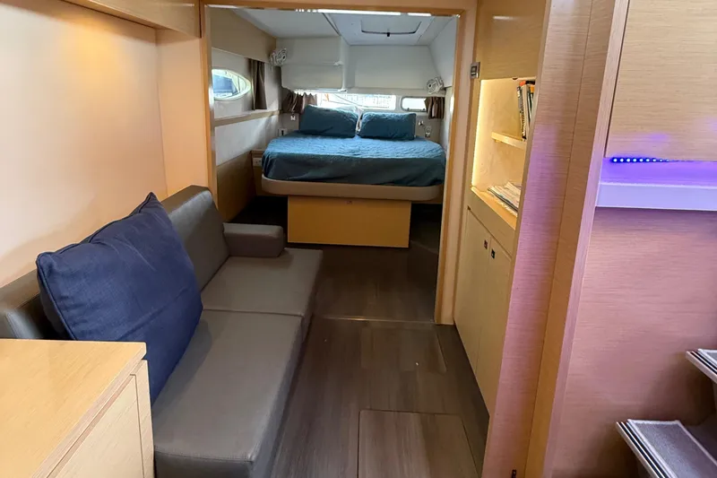Slide: The Image of Interior of 2015 Fountaine Pajot Helia 44 catamaran with cozy bedroom and seating area. - 34