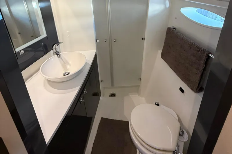 Slide: The Image of Bathroom interior of 2015 Fountaine Pajot Helia 44 catamaran, featuring sink and toilet. - 39
