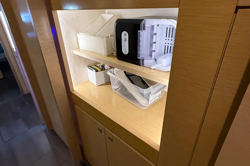 Slide: The Image of Interior storage shelves on a 2015 Fountaine Pajot Helia 44 catamaran. - 40