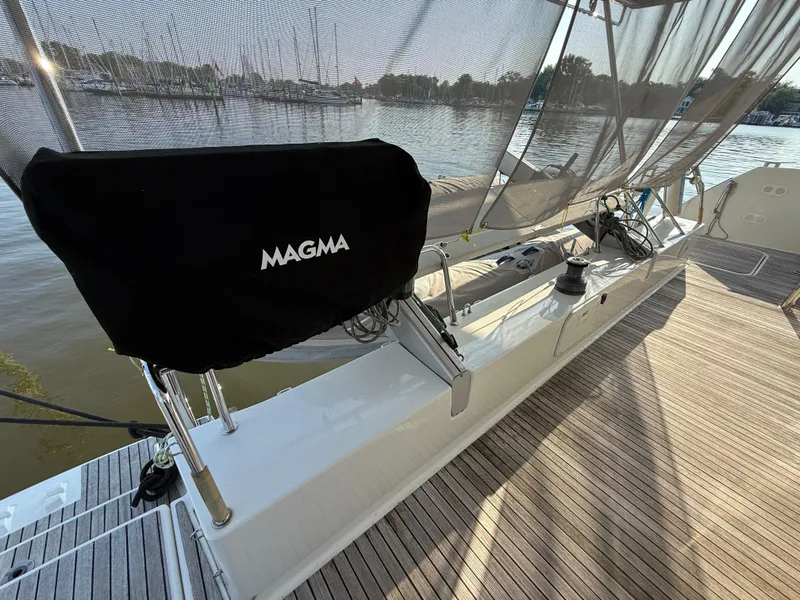 Slide: The Image of Deck of 2015 Fountaine Pajot Helia 44 catamaran with Magma grill cover. - 7