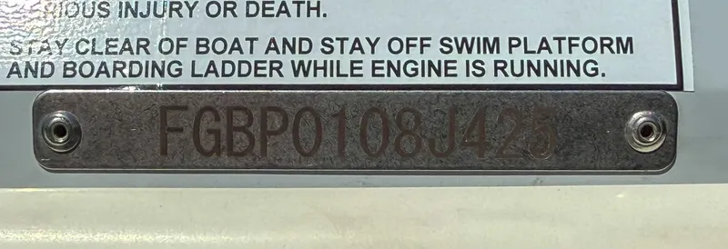 Slide: The Image of VIN plate on 2025 Chaparral 2870 SSX boat with safety warning label. - 25
