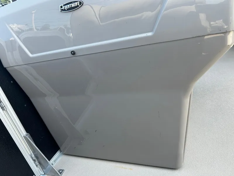 Slide: The Image of 2014 Premier 220 SunSation boat panel with logo, close-up view. - 25
