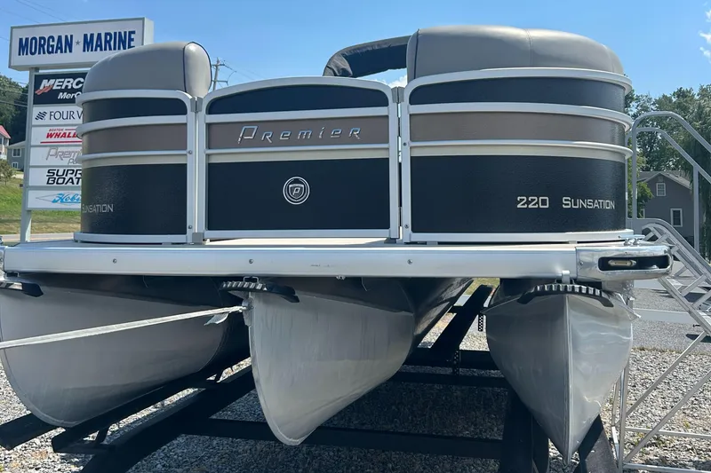 Slide: The Image of 2014 Premier 220 SunSation pontoon boat displayed at Morgan Marine dealership. - 5