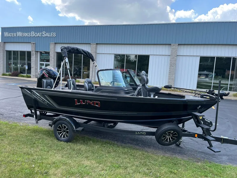 Slide: The Image of 2026 Lund 1775 Impact XS Sport boat at Water Werks Boat Sales dealership. - 1
