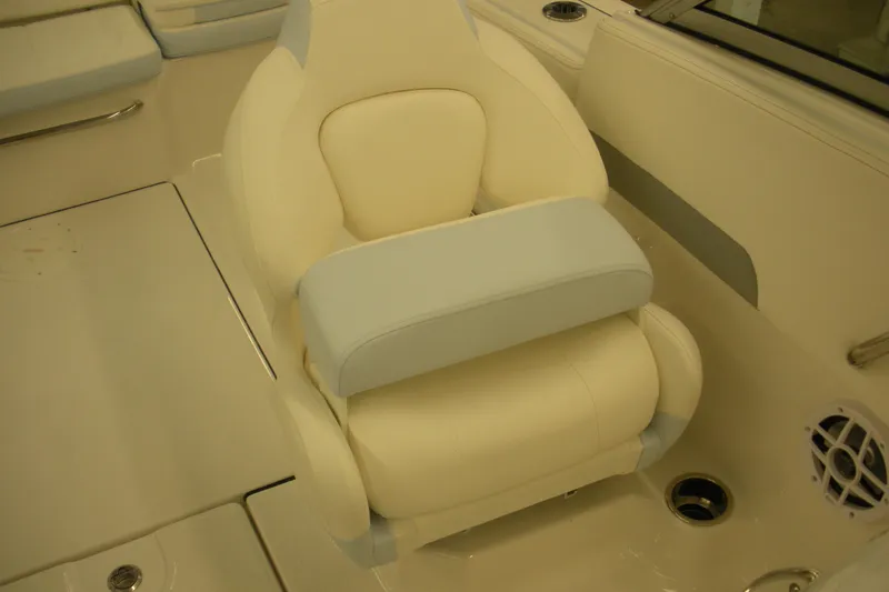 Slide: The Image of 2026 Robalo R207 Dual Console boat interior with cushioned seating. - 13