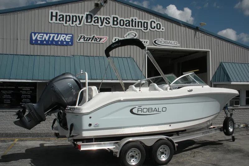 Slide: The Image of 2026 Robalo R207 Dual Console boat on trailer at Happy Days Boating Co. - 22