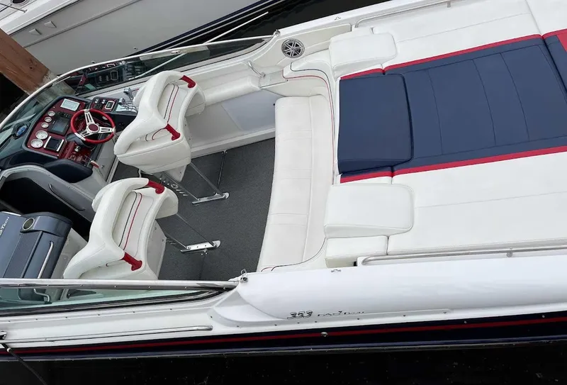 Slide: The Image of 2017 Formula 353 FASTech boat interior with white and red seating, sleek design. - 12