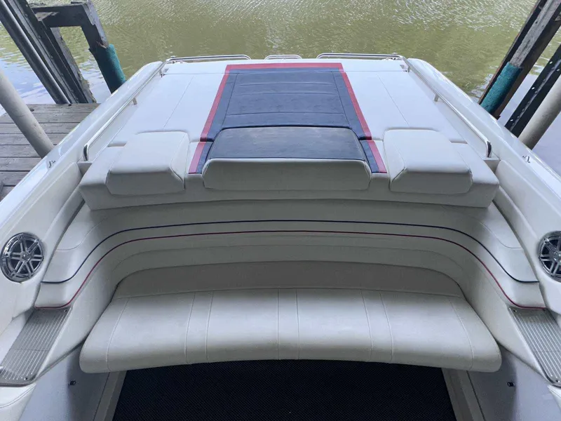 Slide: The Image of 2017 Formula 353 FASTech boat interior with white seating and red accents. - 14