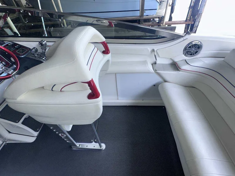 Slide: The Image of 2017 Formula 353 FASTech boat interior with white leather seats and red accents. - 20
