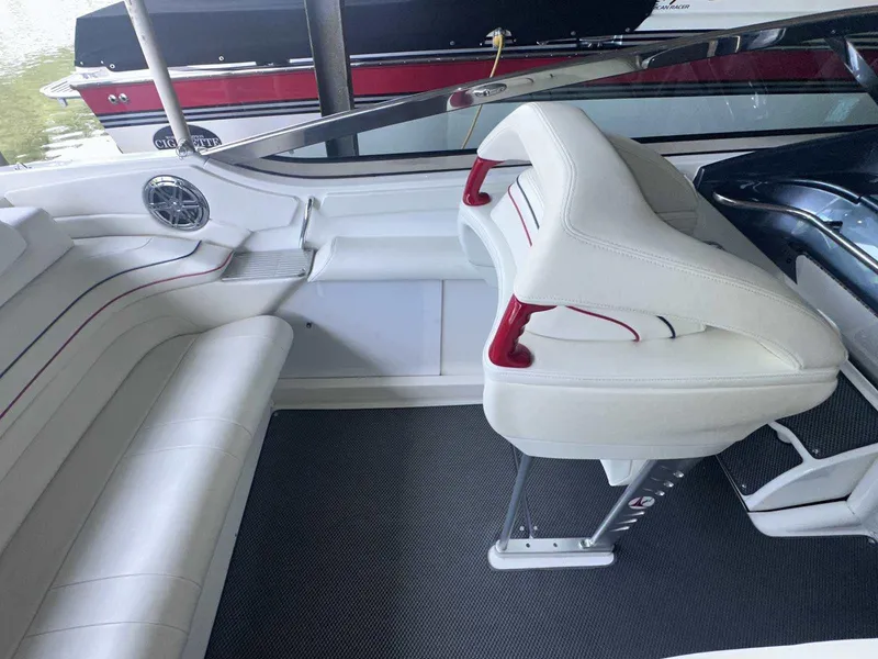 Slide: The Image of 2017 Formula 353 FASTech boat interior with white seating and red accents. - 21