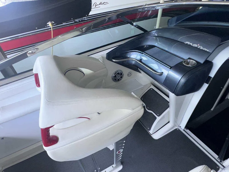 Slide: The Image of 2017 Formula 353 FASTech boat interior with white seating and sleek dashboard design. - 22