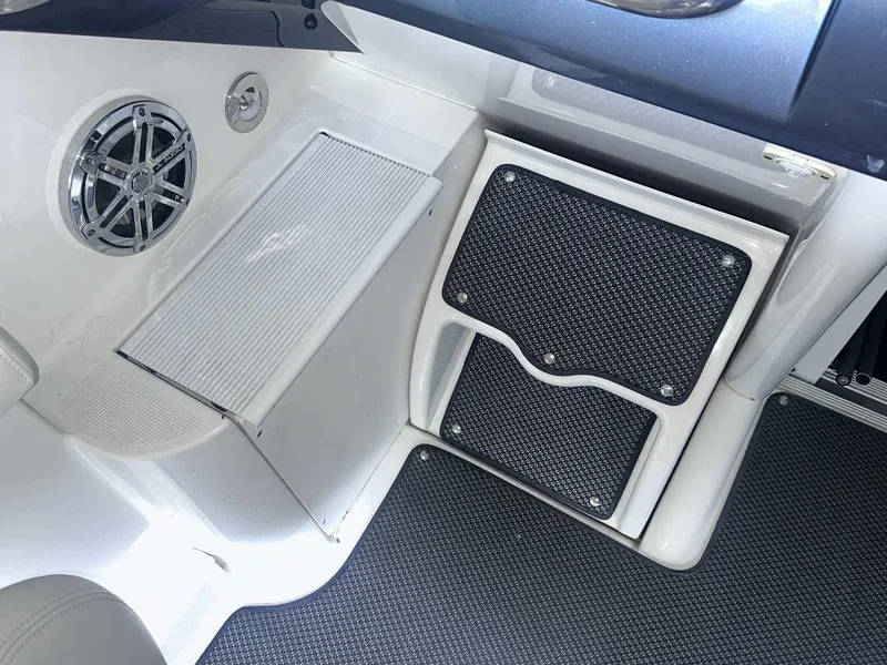 Slide: The Image of Interior of 2017 Formula 353 FASTech boat, featuring speaker and textured flooring. - 24