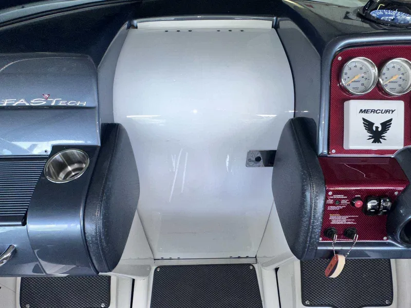 Slide: The Image of 2017 Formula 353 FASTech dashboard with Mercury gauges and controls. - 35