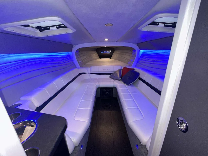 Slide: The Image of Luxurious interior of a 2017 Formula 353 FASTech boat with blue ambient lighting. - 37