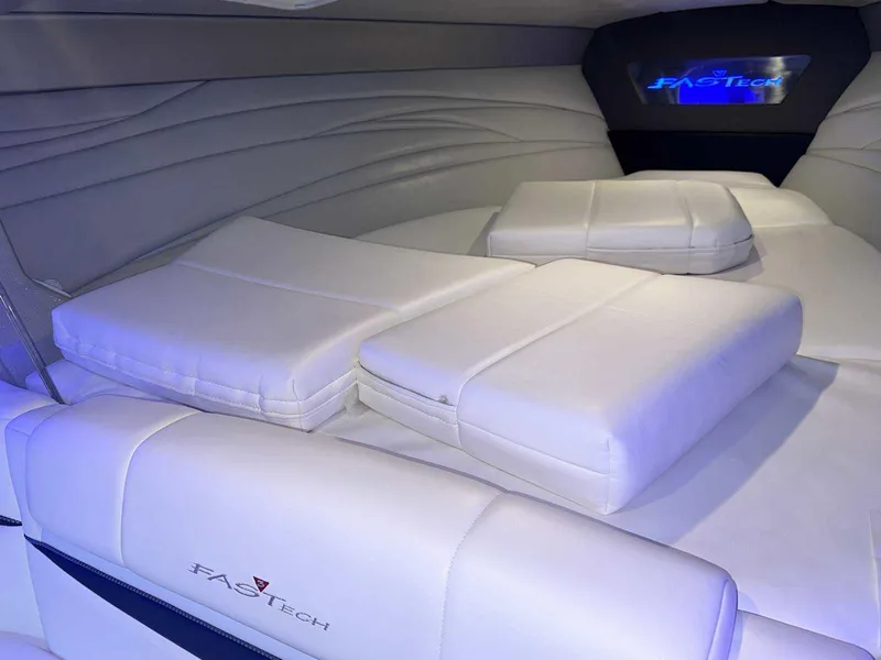 Slide: The Image of 2017 Formula 353 FASTech interior with white cushioned seating and ambient lighting. - 39