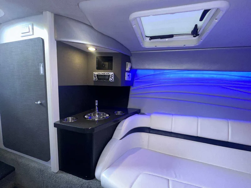 Slide: The Image of 2017 Formula 353 FASTech cabin interior with seating, sink, and blue ambient lighting. - 40