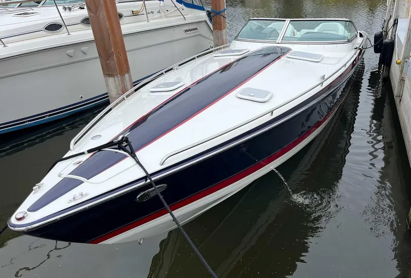 Slide: The Image of 2017 Formula 353 FASTech boat docked, featuring sleek design and vibrant colors. - 5