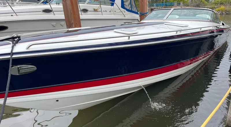 Slide: The Image of 2017 Formula 353 FASTech boat docked, featuring sleek design and vibrant colors. - 6