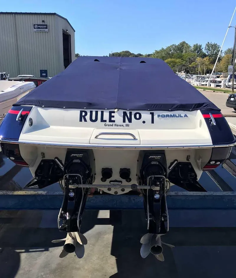 Slide: The Image of 2017 Formula 353 FASTech boat with dual engines, covered, docked in Grand Haven, MI. - 9