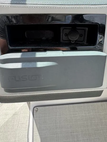 Slide: The Image of Control panel of a 2020 Regal 26 OBX boat with Fusion audio system. - 12