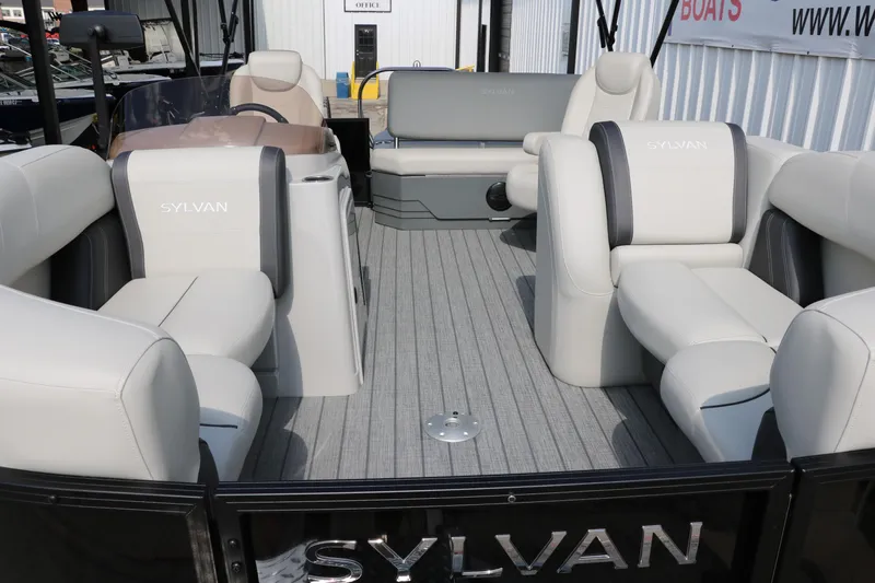 Slide: The Image of 2026 Sylvan Mirage Cruise 8520 CLZ DH pontoon boat with luxurious seating and modern design. - 10