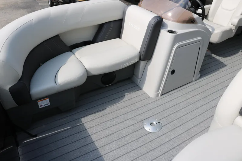 Slide: The Image of Luxurious seating on 2026 Sylvan Mirage Cruise 8520 CLZ DH pontoon boat interior. - 12