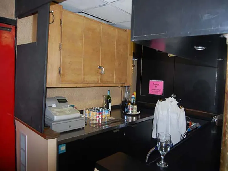 Slide: The Image of Bar area on 1985 Custom Serodino Dinner Boat with cash register and drinks. - 30