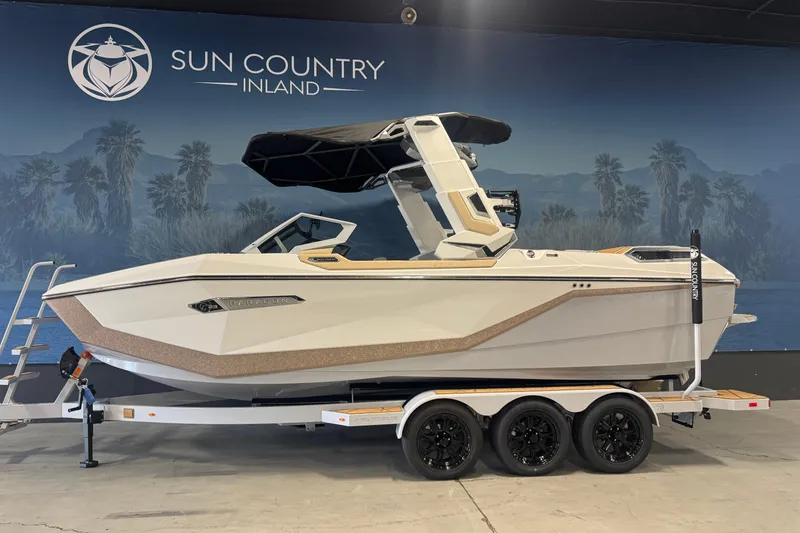 The Image of 2026 Nautique Super Air Nautique G23 Paragon boat on trailer at Sun Country Inland showroom. - 0