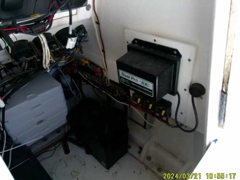 Slide: The Image of 2004 Contender 23 Open boat electrical system with Dual Pro SE charger and wiring. - 29
