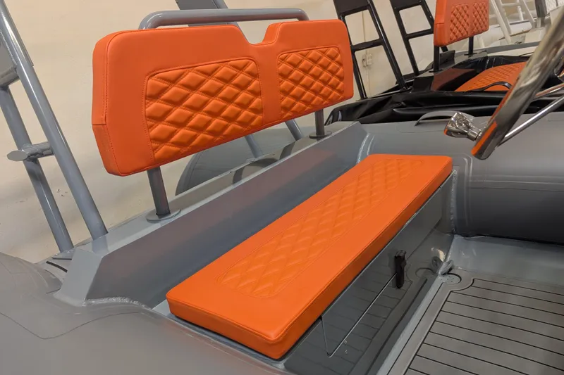 Slide: The Image of 2025 Tide Craft Custom Grey and Orange Catalina 13 inflatable boat with sleek design. - 2