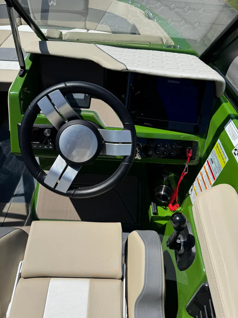 Slide: The Image of 2025 Heyday H22 boat cockpit with modern steering wheel and control panel. - 6