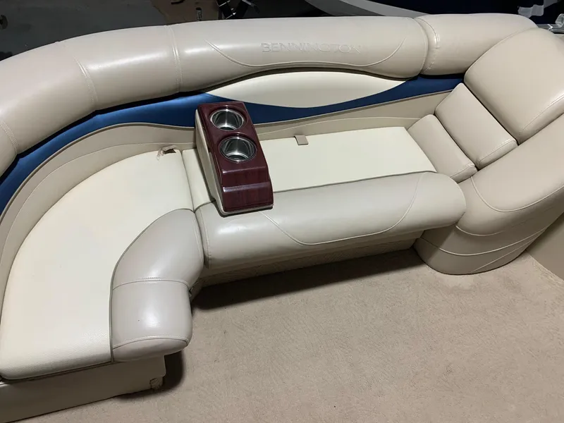 Slide: The Image of Luxurious seating on a 2010 Bennington 2250RCW boat with integrated cup holders. - 10