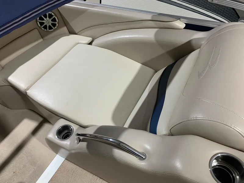Slide: The Image of Luxurious seating on a 2010 Bennington 2250RCW boat with cup holders and speaker. - 13